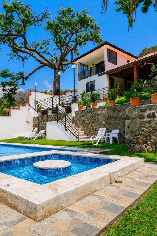Pool terrace and colonial house at Casa Cuscatlan